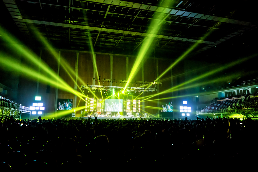 Music Brand Showing On Stage Or Concert Live And Defocused Enter crowded concert with people and bands